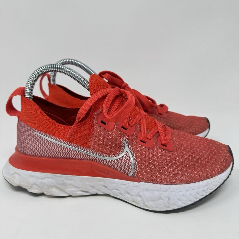 Nike Women's Red Athletic Running Shoes with White Sole